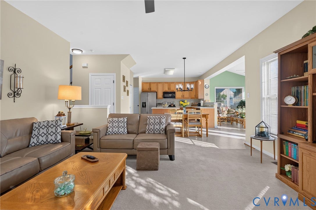 10817 Correnty Drive, Glen Allen, VA 23059 Carpeted living area with neutral wall tones and a ceiling fan