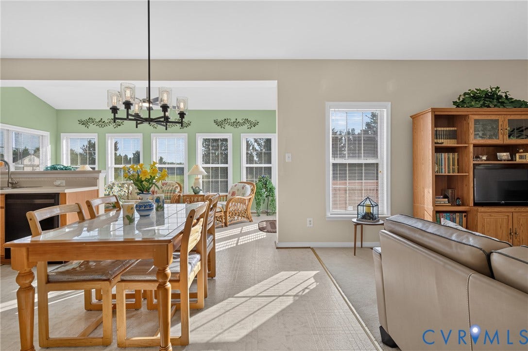 10817 Correnty Drive, Glen Allen, VA 23059 Open concept dining area with a modern chandelier