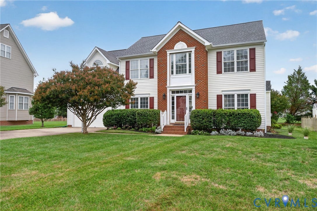 10817 Correnty Drive, Glen Allen, VA 23059 White siding exterior with brick facade accents