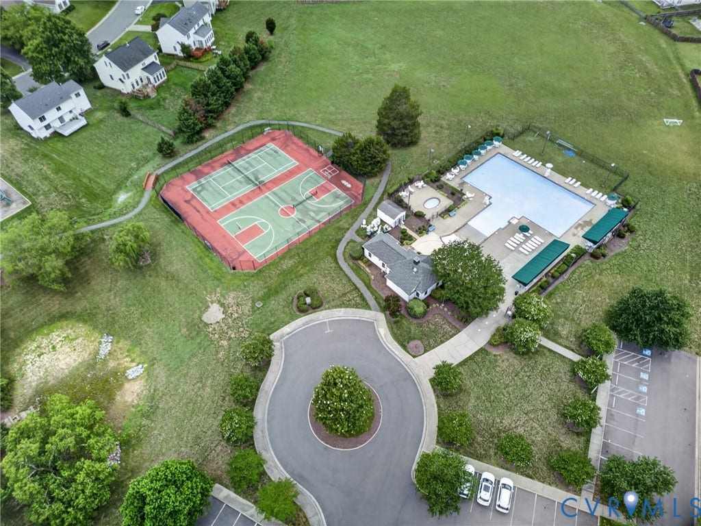 10817 Correnty Drive, Glen Allen, VA 23059 Community amenities featuring a swimming pool, spa, clubhouse, tennis court, and basketball court, all surrounded by green spaces and paved pathways