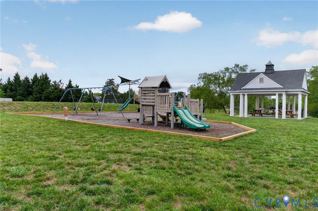 10817 Correnty Drive, Glen Allen, VA 23059 Community playground featuring a swing set, slide, and playset structure