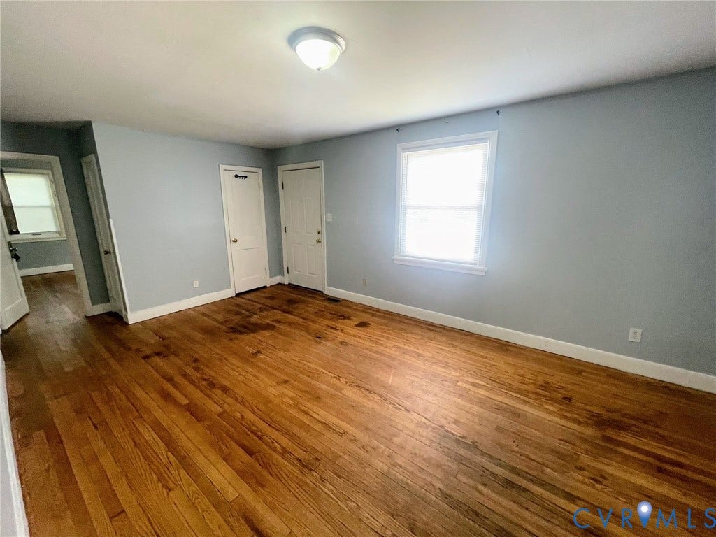 1417 Bowen Street, Oak Grove, Richmond, VA 23224 Coat closet in living room, hallway to bedrooms & bathroom