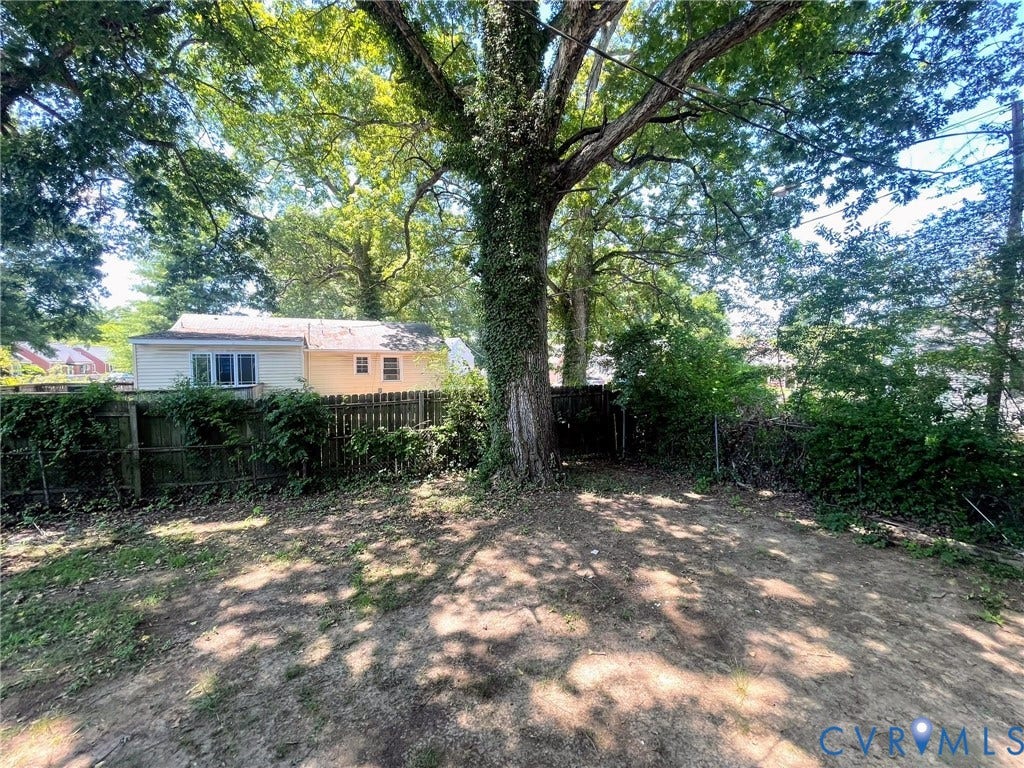1417 Bowen Street, Oak Grove, Richmond, VA 23224 Expansive yard space featuring a mature tree providing natural shade