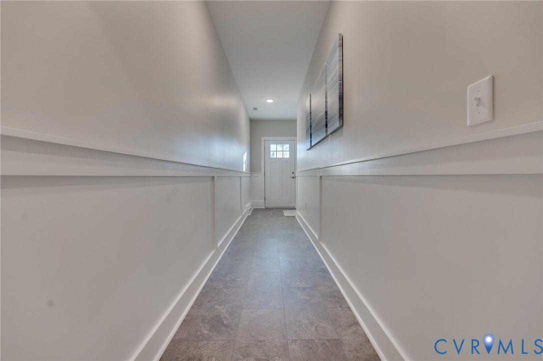 6408 Sanford Springs Cove, Midlothian, VA 23112 Hallway featuring board and batten wainscoting, recessed lighting, and tile flooring