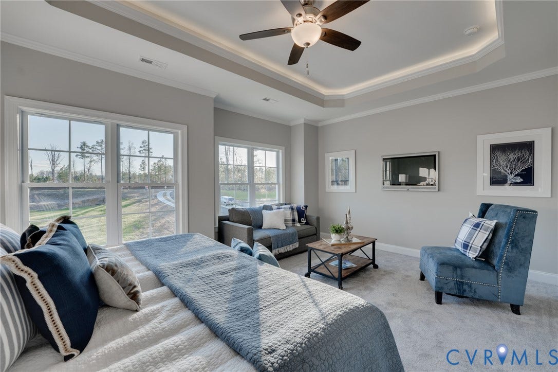6408 Sanford Springs Cove, Midlothian, VA 23112 Tray ceiling with recessed lighting and a ceiling fan, light gray wall paint, and white trim
