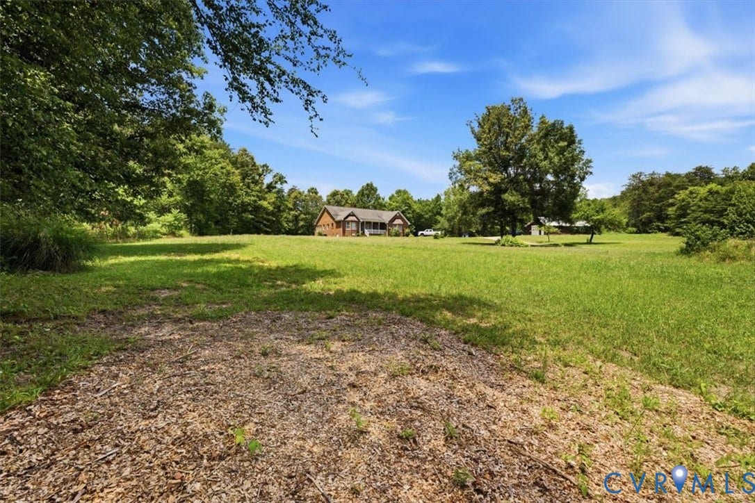 Expansive green lawn providing a substantial outdoor area