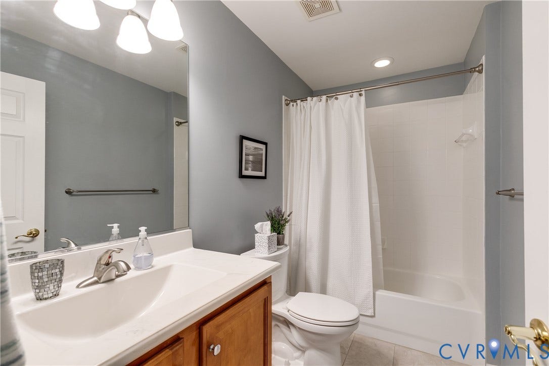 2nd Full Bath Featuring Tile Flooring and Combo Shower/Tub.