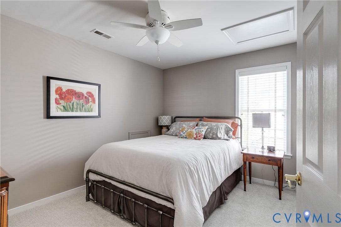 2nd Floor Bedroom Featuring Carpet and Ceiling Fan.