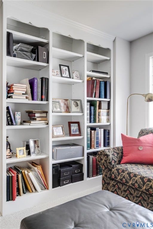 Loft Area Featuring Built-In Bookcase.
