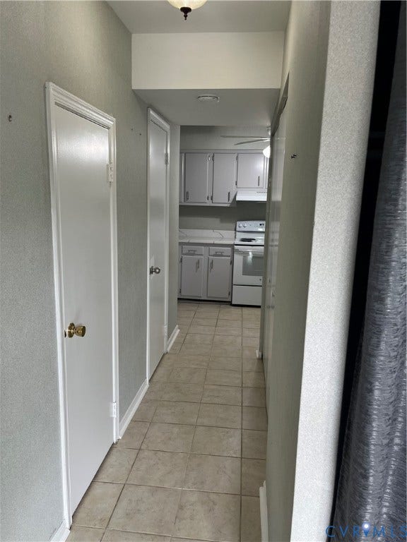 1519 Harpers Ferry Court, Henrico, VA 23228 Hallway with tiled flooring, leading to kitchen