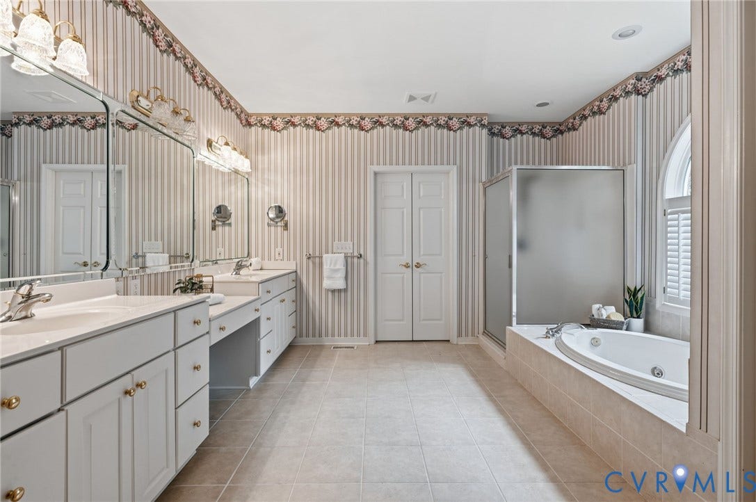 2065 Garrett Lane, Powhatan, VA 23139 1st floor primary bath suite and walk-in closet.
