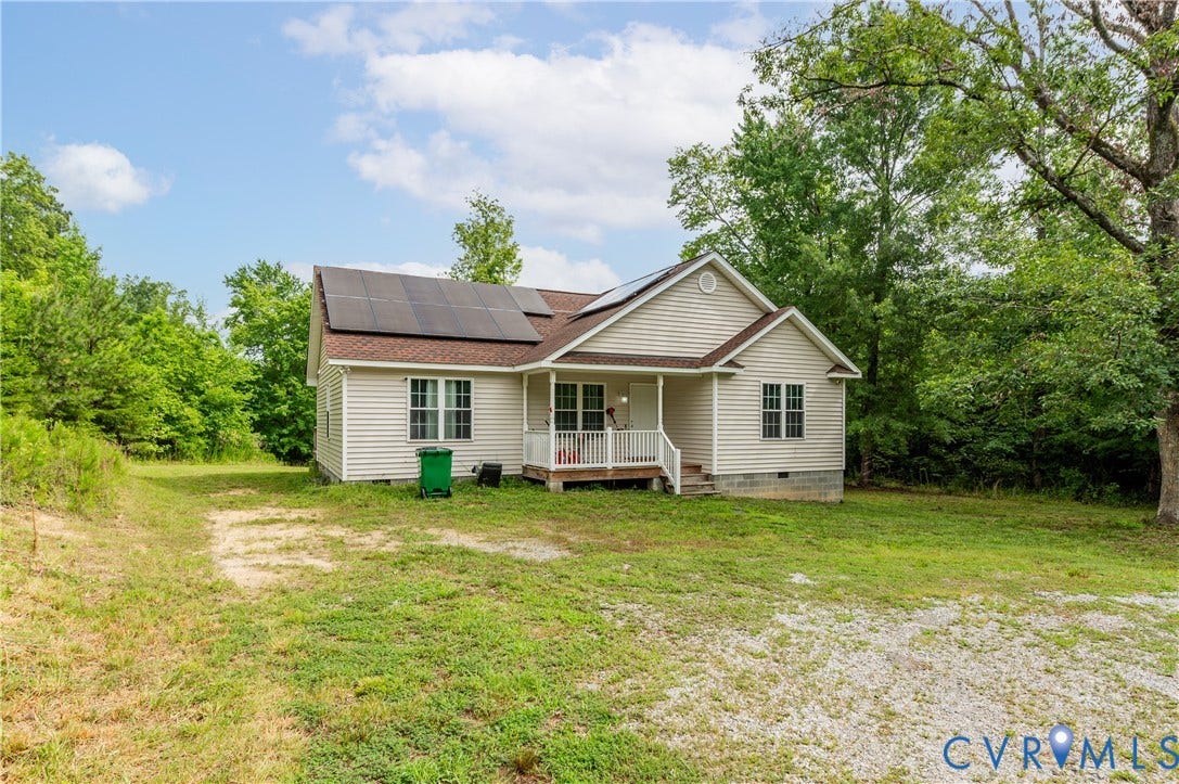 24580 St James Road, Amelia, VA 23083 Siding exterior with a covered front porch featuring white railings
