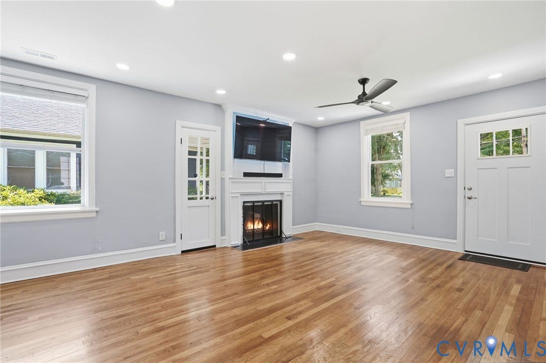 6929 Woodrow Terrace, Richmond, VA 23228 Living space featuring wood-finish flooring, a white fireplace with mantle, recessed lighting, and a ceiling fan