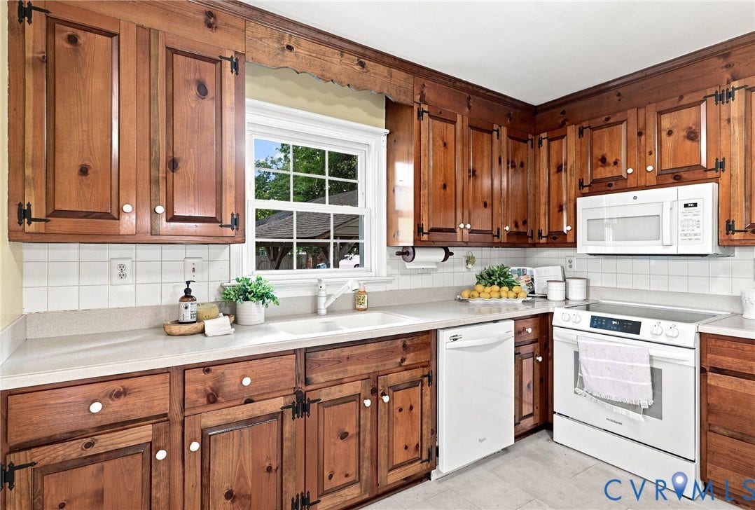 4001 Saldale Drive, North Chesterfield, VA 23237 Hardwood flooring, painted walls, and an open doorway leading to an additional space