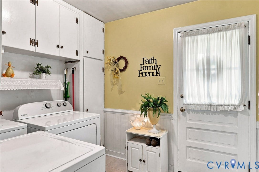 4001 Saldale Drive, North Chesterfield, VA 23237 Hardwood flooring, two windows, ceiling fan, and built-in cabinetry
