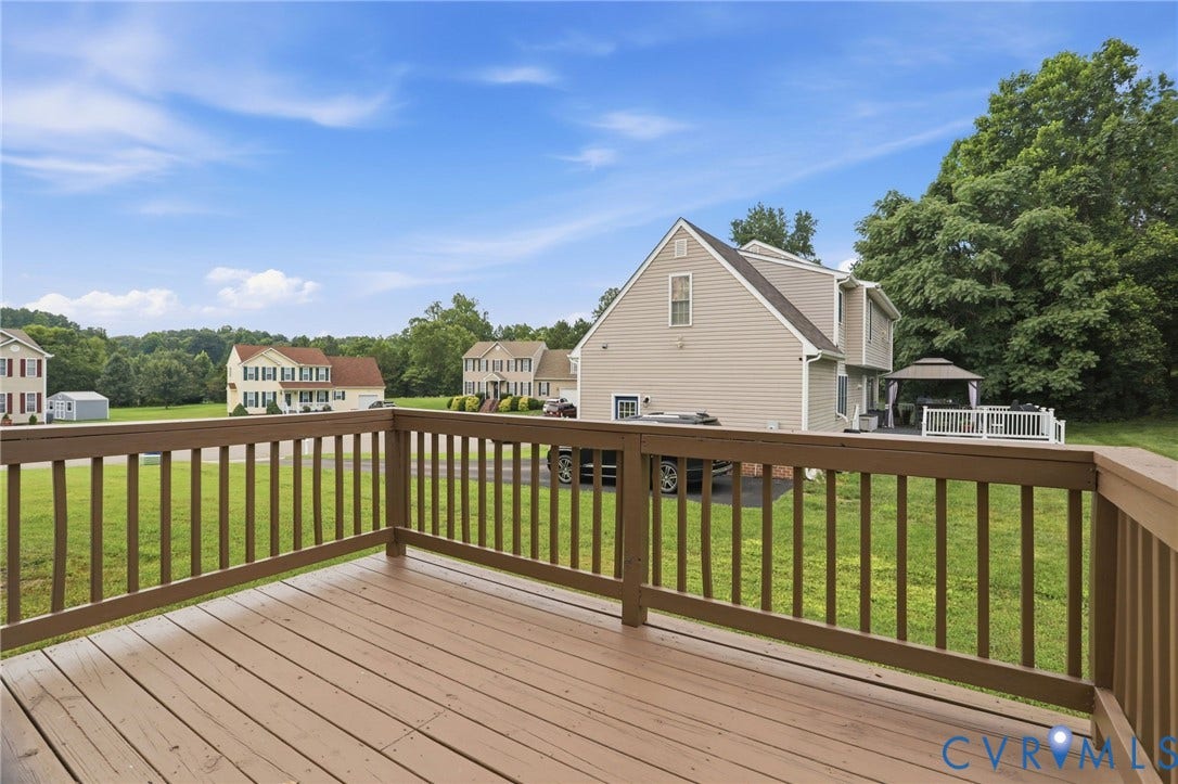6412 Autumn Mist Way, Chesterfield, VA 23832 Outdoor deck with wood-finish flooring and matching railings