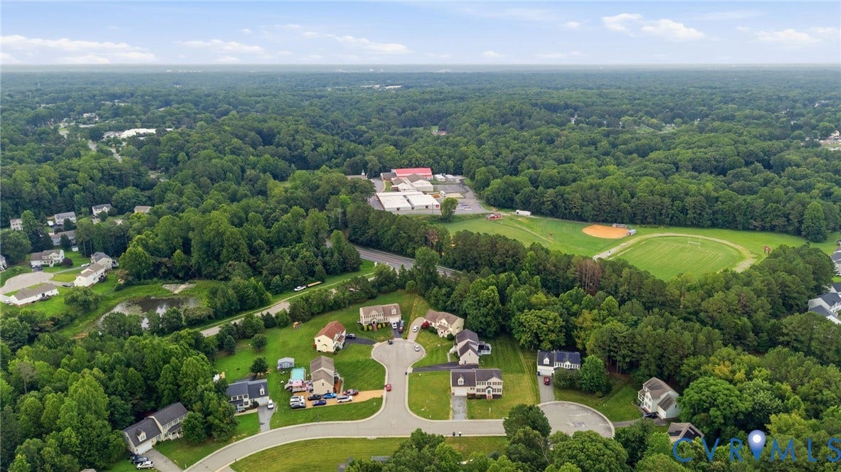 6412 Autumn Mist Way, Chesterfield, VA 23832 Aerial perspective showcasing a residential area amidst extensive natural landscaping