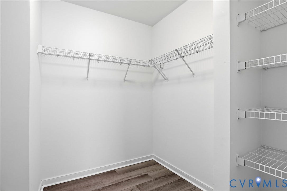 6412 Autumn Mist Way, Chesterfield, VA 23832 Spacious closet featuring white wire shelving, white walls, and wood-finish flooring