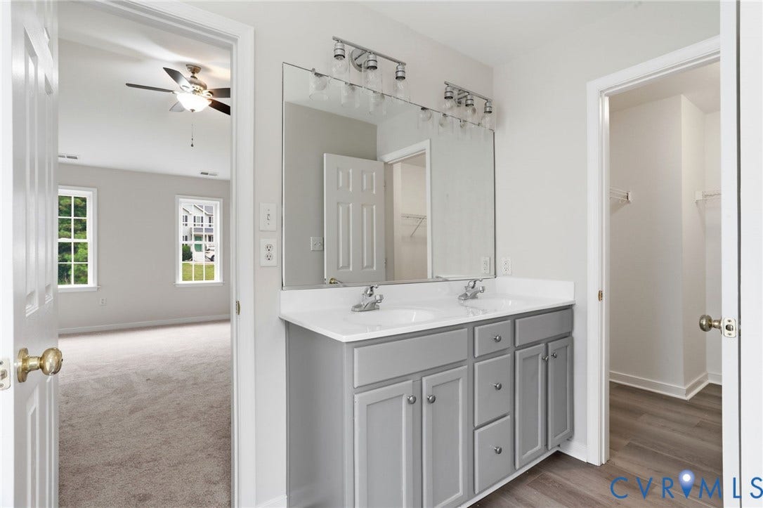 6412 Autumn Mist Way, Chesterfield, VA 23832 Double vanity with gray cabinetry, white countertops, and chrome fixtures