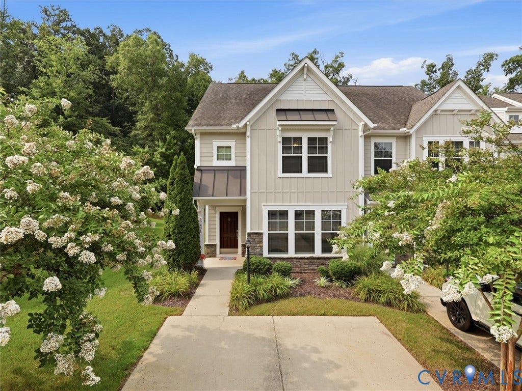 17431 Memorial Tournament Drive, Wynstone Park, Moseley, VA 23120 Welcome to this stunning END-UNIT townhouse nestled in the highly sought-after, award-winning Magnolia Green community! Perfectly positioned with peaceful green space in both the front and rear, this beautifully appointed home offers the ideal blend of elegance, comfort, and low-maintenance living.