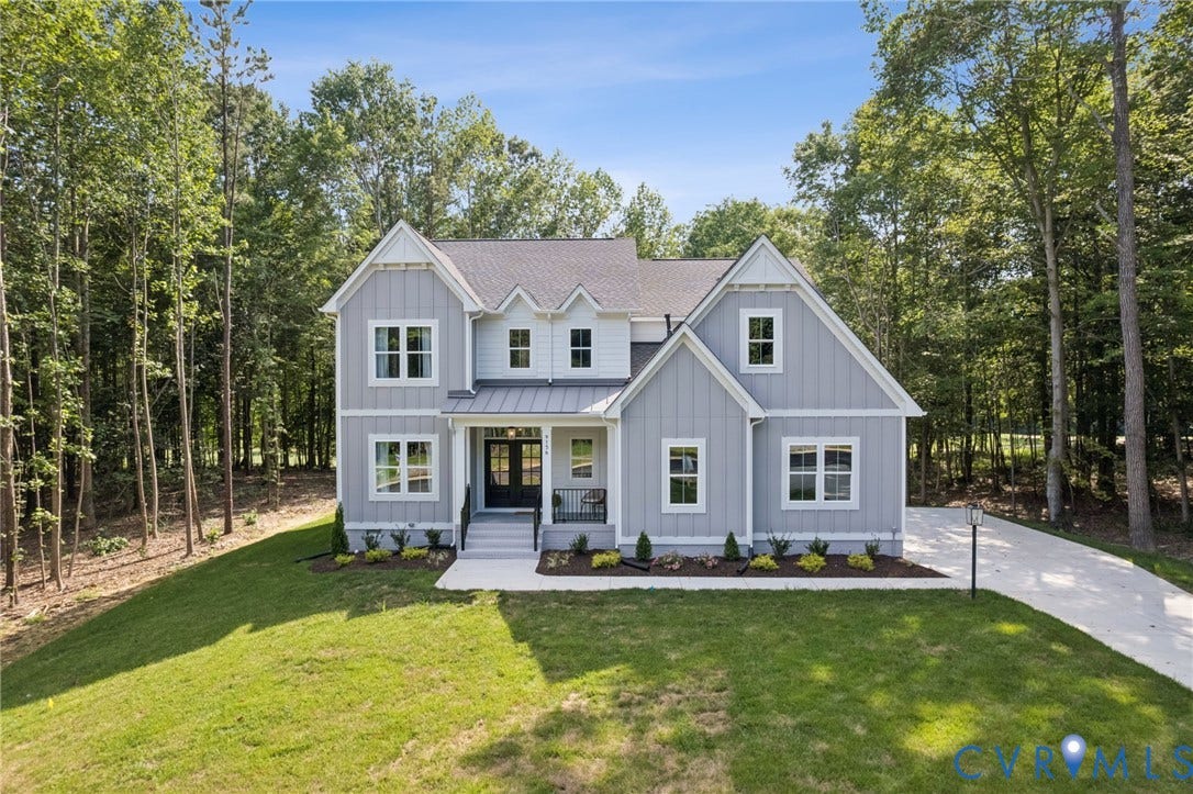 9156 Terroir Lane, Viniterra Villas, New Kent, VA 23124 Contemporary farmhouse-style exterior featuring light gray siding and white trim accents