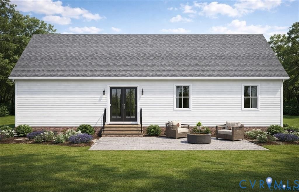 725 Goldmine Road, Louisa, VA 23093 Rear exterior featuring white horizontal siding, a gray shingle roof, and a brick foundation