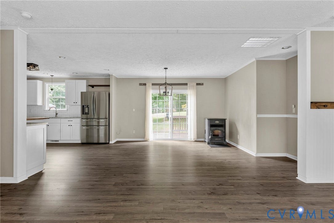 4106 S Spotswood Trail, Trevilians, Louisa, VA 22942 Open concept living area with wood-finish flooring