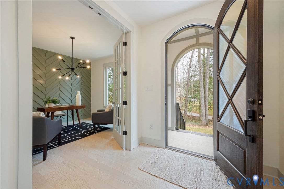 8919 Rustic Road, Richmond, VA 23235 Arched entry door with decorative glass panels and dark wood finish