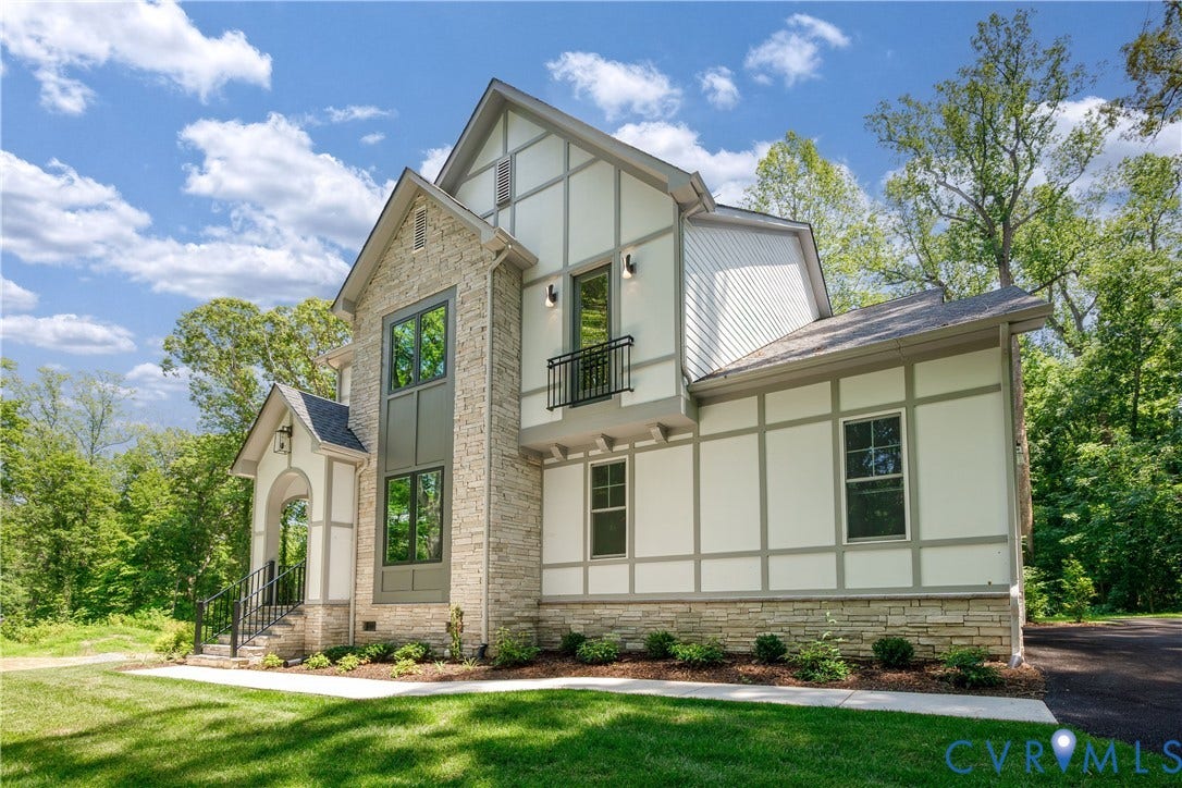 8919 Rustic Road, Richmond, VA 23235 Stone and siding exterior with dark framed windows
