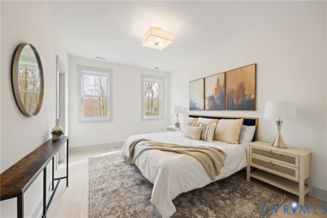 8919 Rustic Road, Richmond, VA 23235 Bedroom 3, 2nd floor with light wood-flooring, closet & light fixture