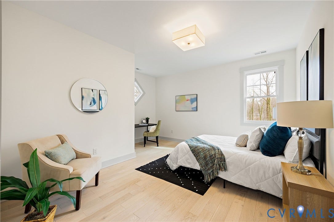8919 Rustic Road, Richmond, VA 23235 Bedroom 2, 2nd floor. Light wood-finish flooring throughout