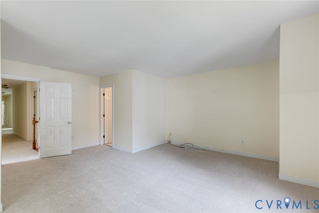 This large bedroom over the garage is the perfect flex space. An en suite bath allows for private guest space.