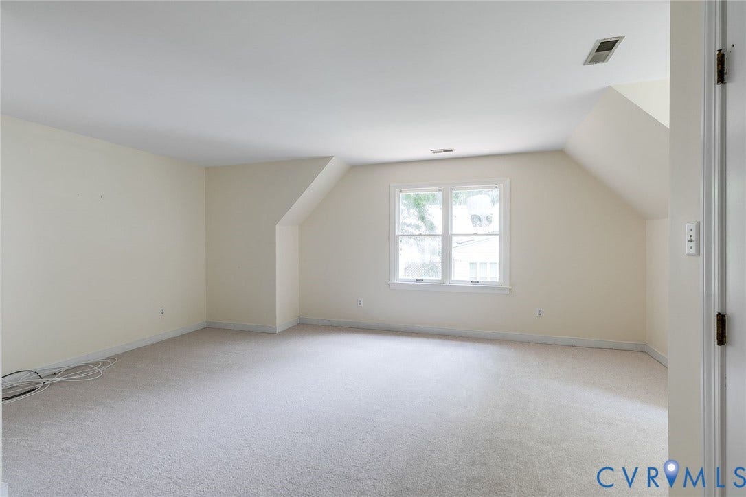 New wall-to-wall carpet in this expansive room.