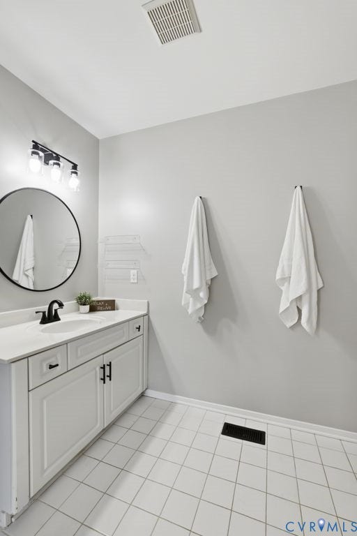 3819 Daniels Street, Chesterfield, VA 23831 Bathroom featuring a white vanity with paneling and dark hardware, a rectangular undermount sink, and a dark single-handle faucet