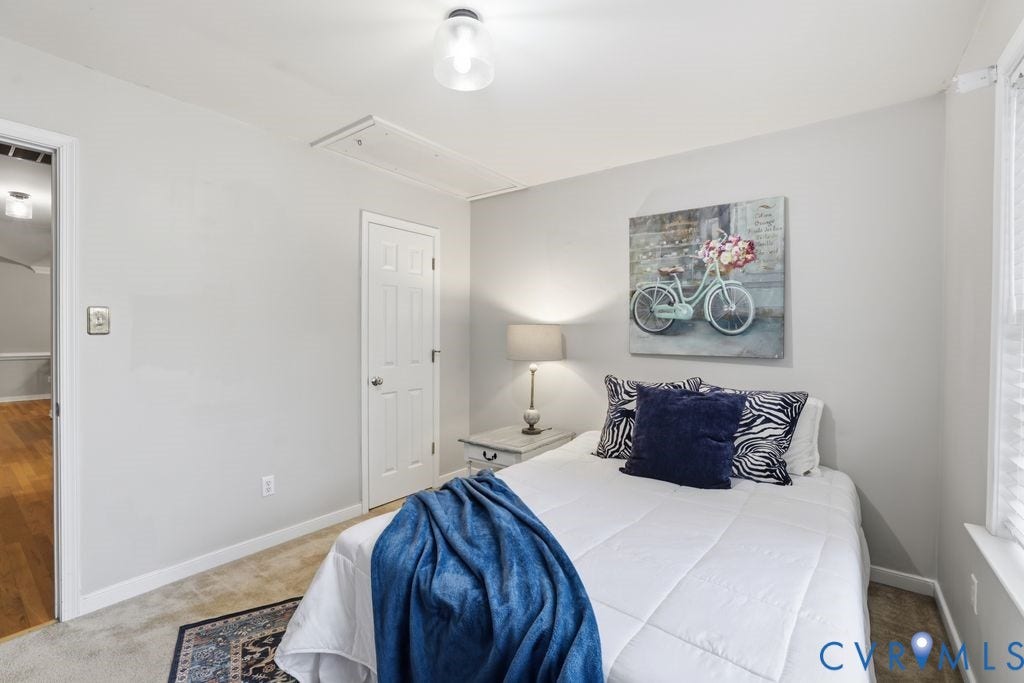 3819 Daniels Street, Chesterfield, VA 23831 Carpeted room featuring light gray walls, white trim, a flush-mount ceiling light fixture, and a window with blinds