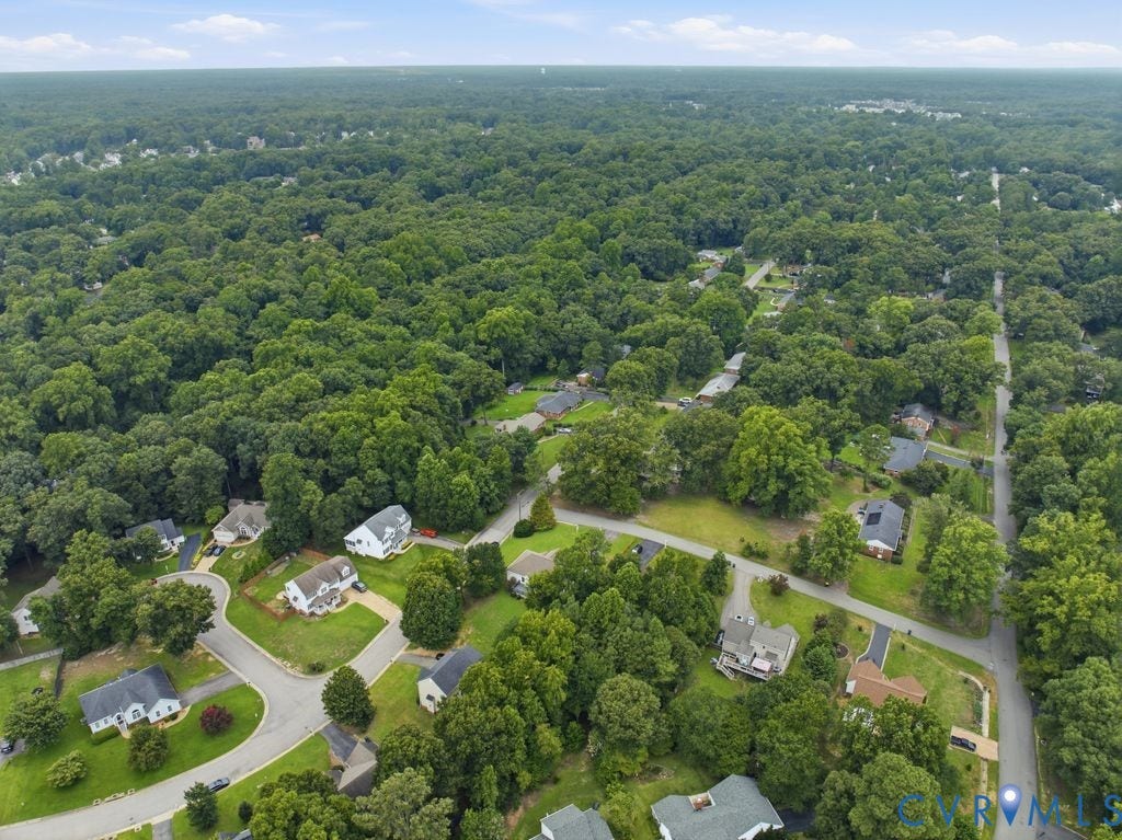 3819 Daniels Street, Chesterfield, VA 23831 Expansive residential area featuring mature tree coverage, paved roadways, and individual property landscaping