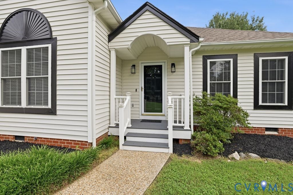 3819 Daniels Street, Chesterfield, VA 23831 Front entrance featuring a covered porch with white railings, dark grey steps, and a black entry door