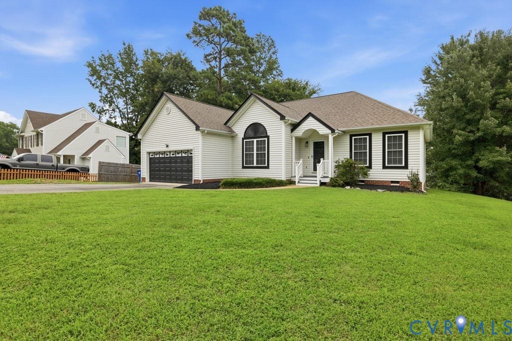 3819 Daniels Street, Chesterfield, VA 23831 White siding exterior with black trim accents and a dark shingle roof
