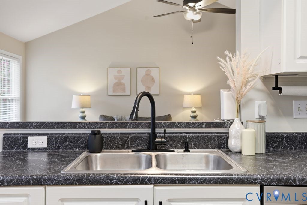 3819 Daniels Street, Chesterfield, VA 23831 Kitchen area featuring a stainless steel dual-basin sink with a matte black gooseneck faucet