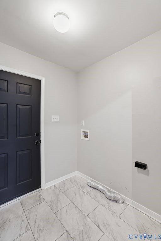 3819 Daniels Street, Chesterfield, VA 23831 Utility room featuring light grey walls, grey and white rectangular tile flooring, a black paneled door with round hardware, and a ceiling-mounted globe light fixture