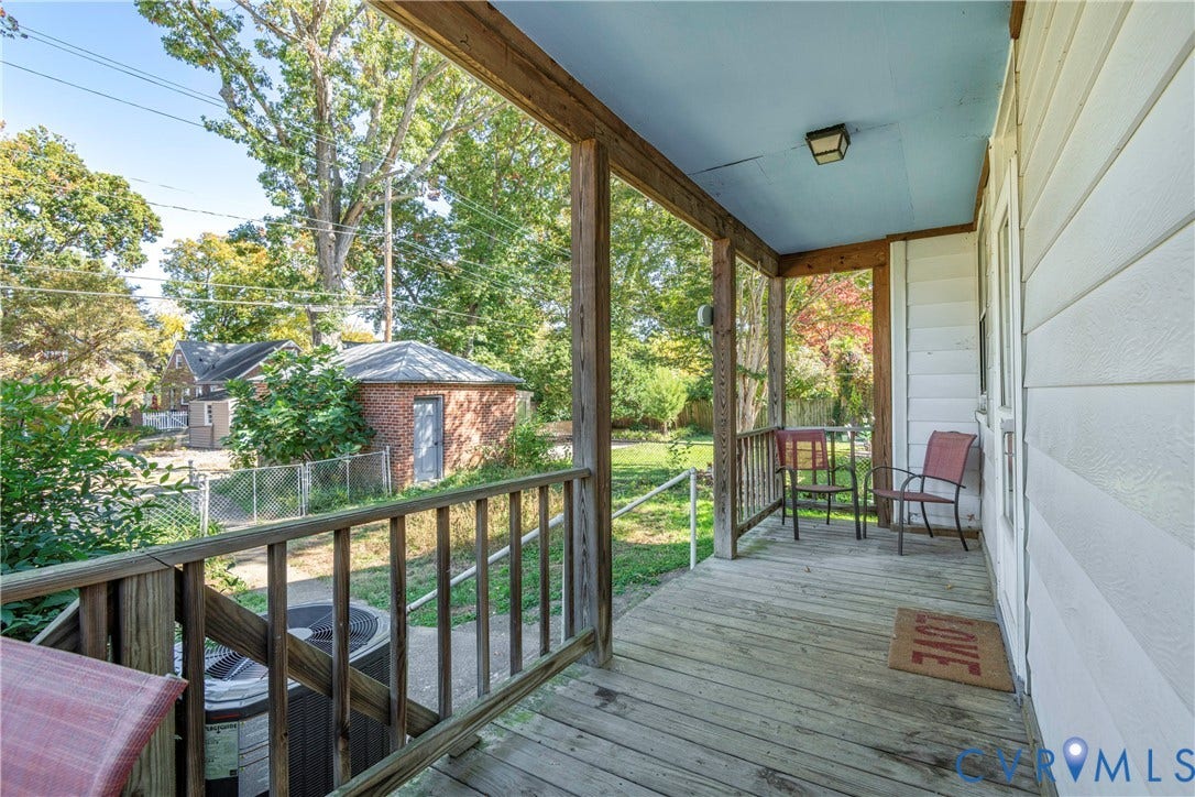 4404 Patterson Avenue, Richmond, VA 23221 Covered porch with wood flooring, wood railings, and a light blue ceiling