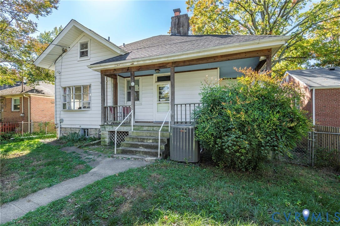 4404 Patterson Avenue, Richmond, VA 23221 White siding residence with a covered front porch featuring wood posts and a painted ceiling