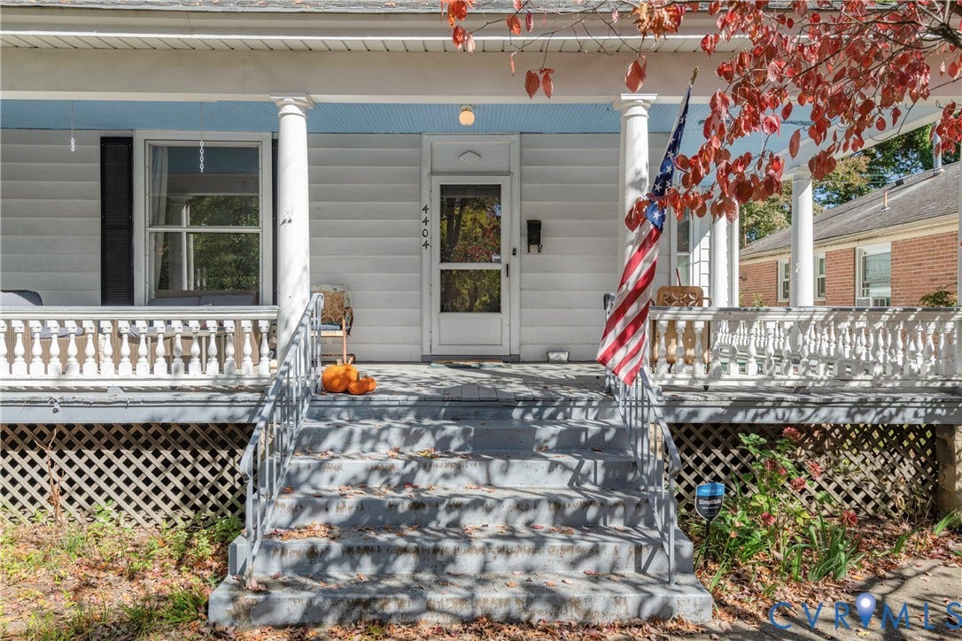 4404 Patterson Avenue, Richmond, VA 23221 Front porch with white balustrade railing, painted stairs, and two round columns