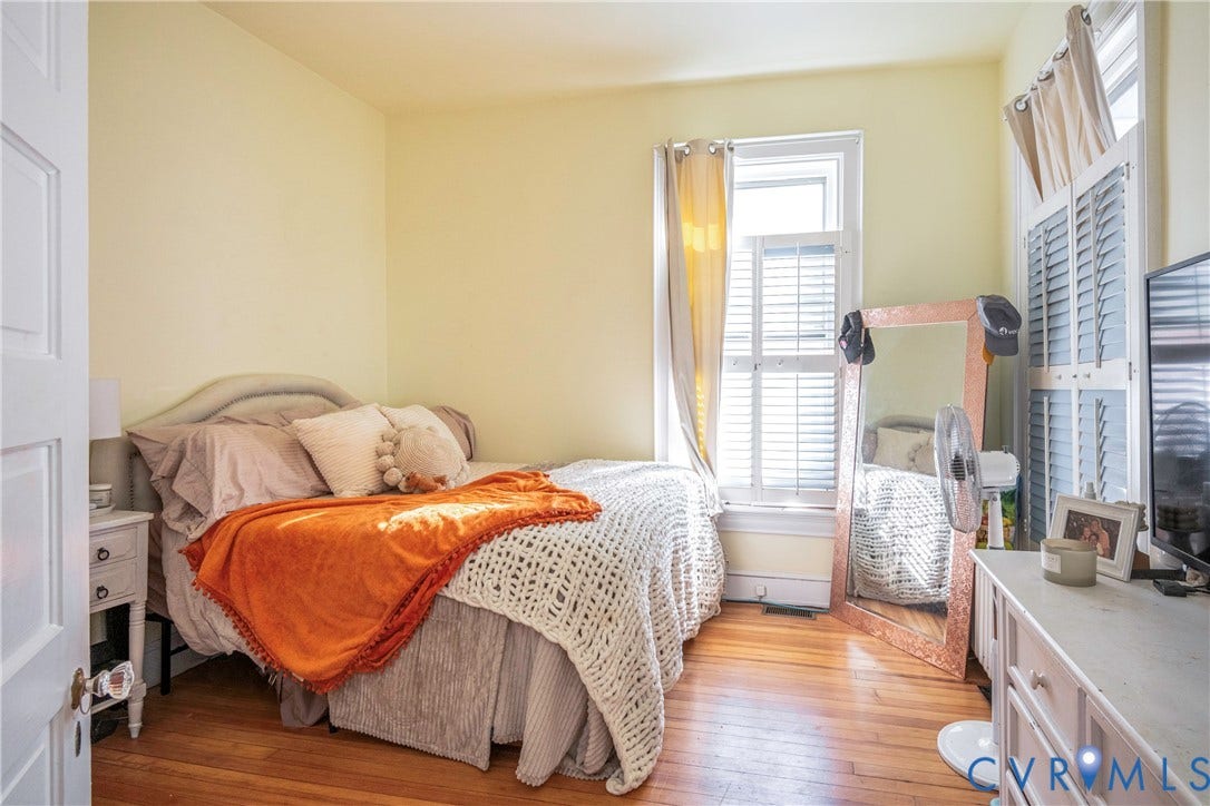 4404 Patterson Avenue, Richmond, VA 23221 Hardwood flooring complements pale yellow walls