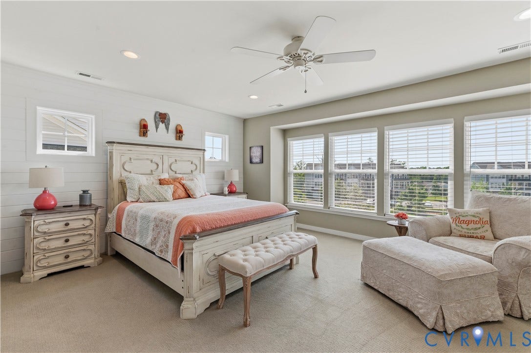 10414 Perennial Drive, Henrico, VA 23233 Bedroom featuring light-colored carpet flooring, a ceiling fan, recessed lighting, and a prominent wall with horizontal paneling