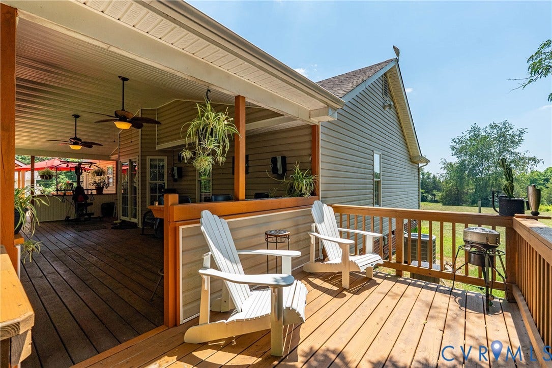 Expansive wood deck with a partial covered area