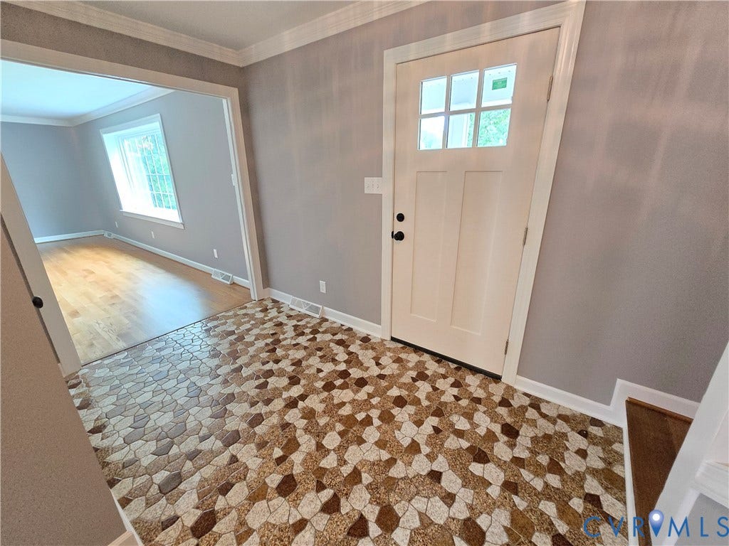 3901 Buckland Place, Chester, VA 23831 Entryway featuring decorative floor tile and a paneled front door with divided lites