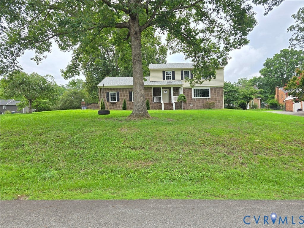 3901 Buckland Place, Chester, VA 23831 Traditional brick and siding exterior with a welcoming covered front entry