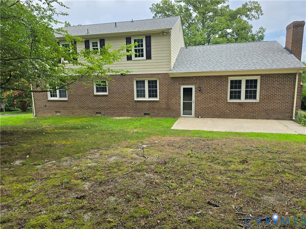 3901 Buckland Place, Chester, VA 23831 Brick exterior with an upper level of horizontal siding, featuring multiple double-hung windows with dark shutters