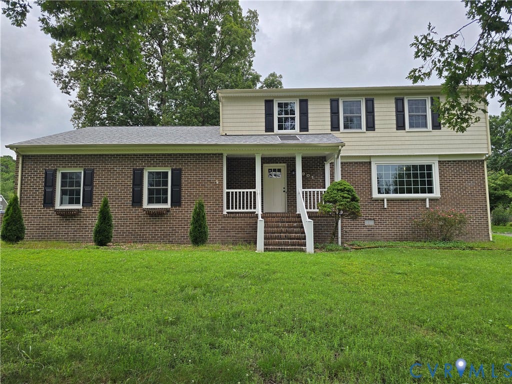 3901 Buckland Place, Chester, VA 23831 Brick and siding exterior featuring a covered front porch with white vinyl railings, a front entry door with transom window, and a large bay window